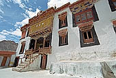 Ladakh - Hemis Gompa, the main monastery halls with the characteristc red painted windows and woden balconies on white washed faades